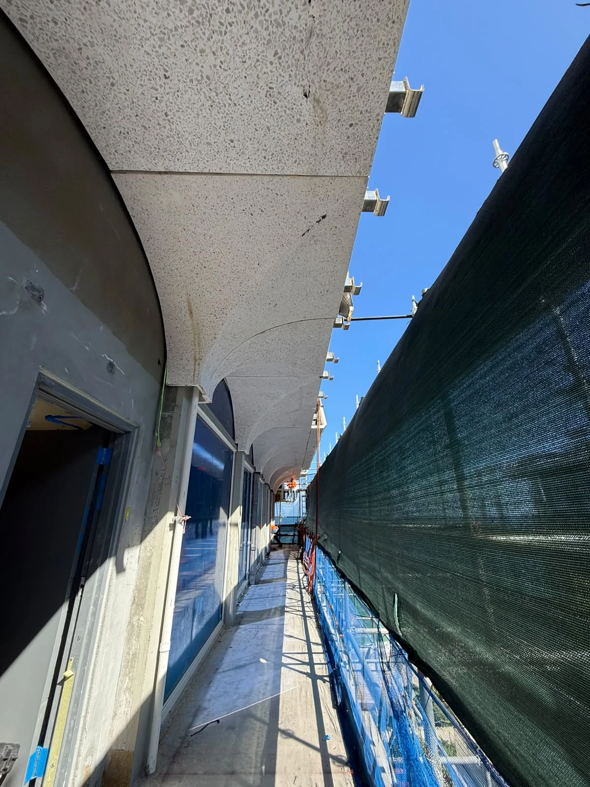 Curved surface and joints between GFRC components above the balcony