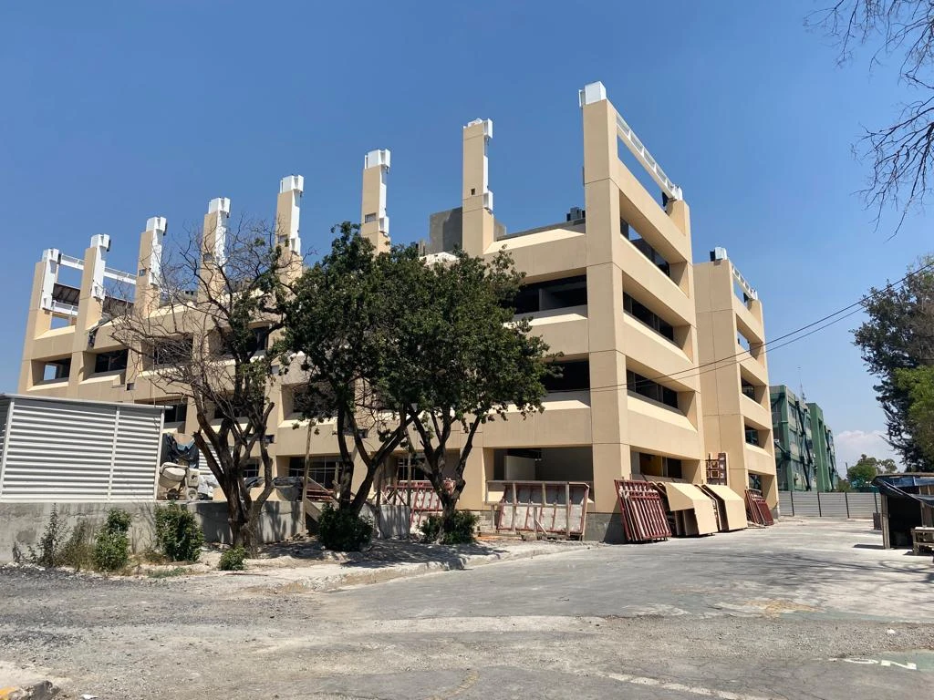 Sand-colored facade during construction
